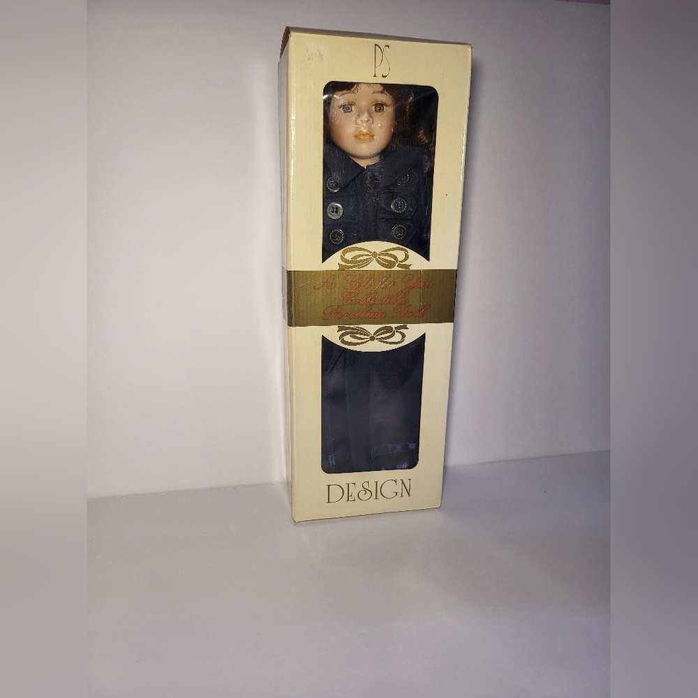 Porcelain Doll in Navy Coat